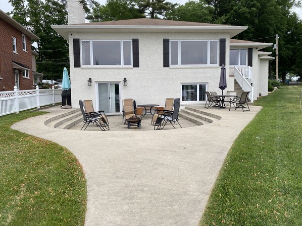 Freshly painted exterior with great patio for BBQ or sitting around fire pit.