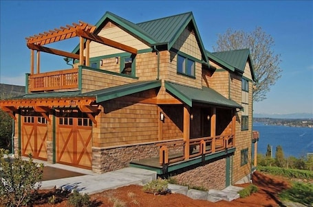 Street side view with Lake Washington in background