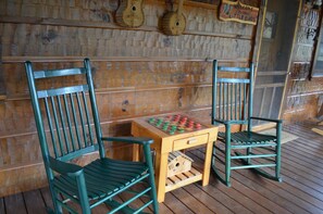 A game of checkers or chess on the front porch.
