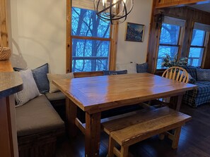 Plenty of room for 8 during meals and games at the heart of the cabin