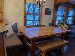 Plenty of room for meals and games at the heart of the cabin