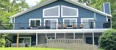 Lake Front view of the house.  New (2019) Hot Tub on lower left.