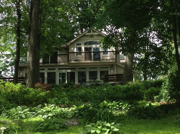Lakefront home with a wall of windows facing Upper Greenwood Lake.