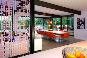 Huge indoor dining area for 14.  Opens to kitchen and outdoor lounge, great view