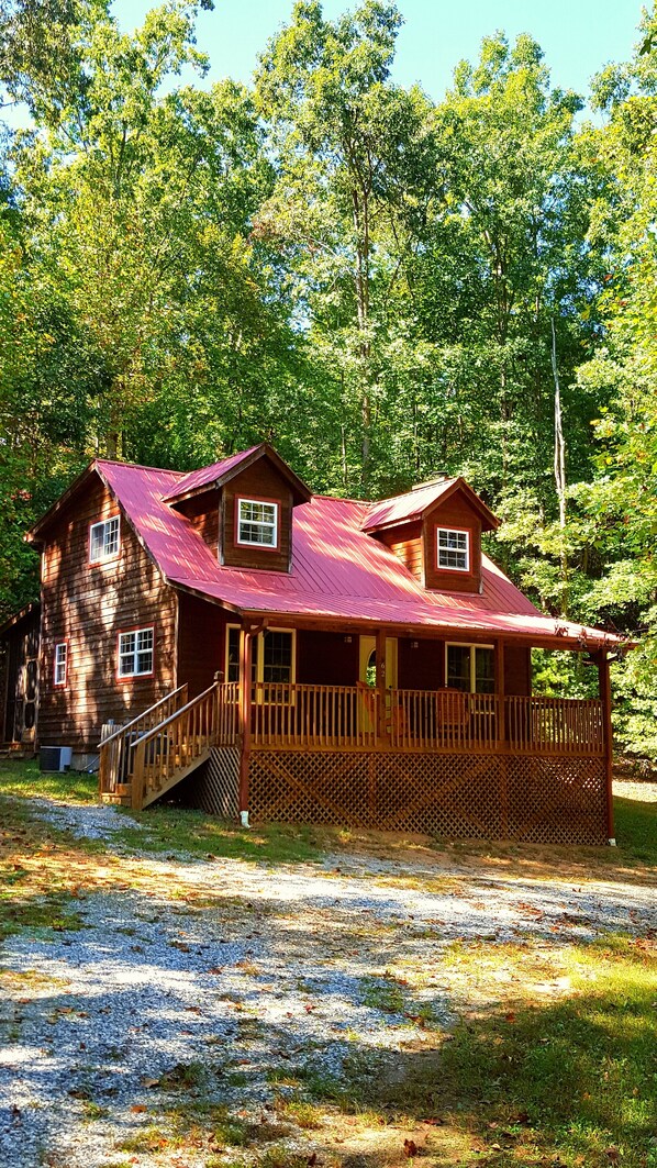 Cedar Sided Cabin with Red Metal Roof