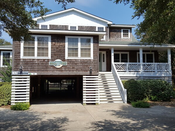 Street view of old Nags Head style cottage. Parking for 6-7 cars.