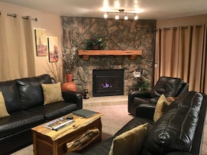 Living room with warm gas fireplace 