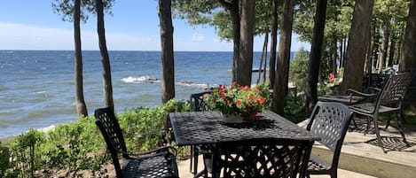 Waterfront Front deck with table and 4 chairs, 2 chairs with side table 