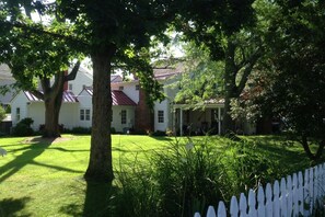 Yard and back of house with Porch