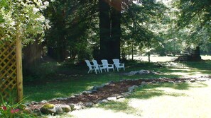 Backyard path to campfire ring and surrounding meadows.