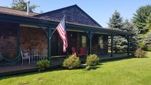 The entry has a delightful wraparound veranda