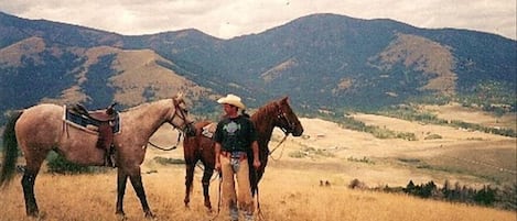 Take a scenic horseback ride with amazing mountain views!