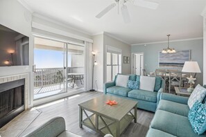 Living Room Surrounded by Windows Overlooking Beach at 513 Barrington Court