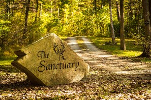 Giant Stone Marks The Road Up To The Sanctuary