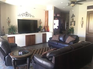 Family room with 72 inch HD TV, Netflix access, games, Xbox, puzzles, & DVD's.