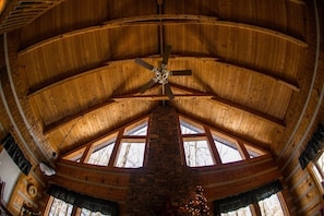 Beautiful High Wooden Ceilings with Large Glass Windows for outside View.