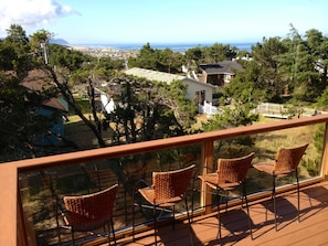 Wind protected southwest facing deck with Cape Perpetua in the background. 