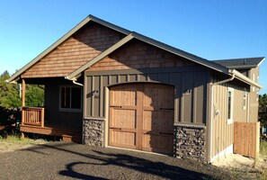 Newly constructed house, custom garage door and covered porch