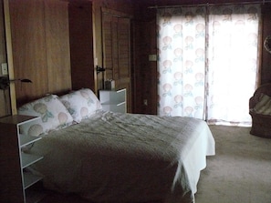 master bedroom with queen bed