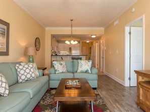 The well appointed living room features seating for 12 and a pull out sofa