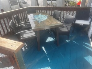 Welcoming deck to enjoy morning coffee or evening cocktails