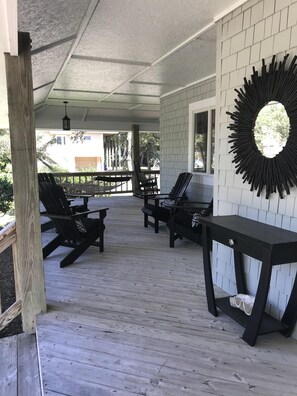 Enjoy multiple seating and relaxation options on the porch! 
