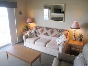 Living area with great views. Sofa sleeper & Lay-z-boy recliner.