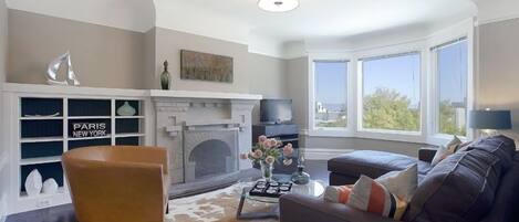 Living room with peek-a-boo views of the City and Dolores Park 