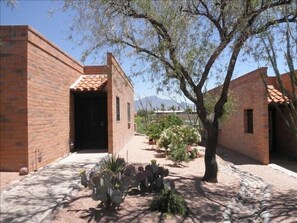 Front of Casita with mountains in background and side access to back patio!!