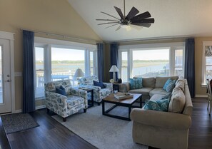 Expansive channel views from living room  
