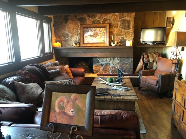 Warm and inviting living room with electric fire place 