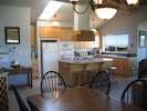Enjoy our gourmet kitchen, with gas range, and convection & microwave ovens.