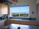 Even the kitchen sink benefits from the sweeping, panoramic views of the coast!