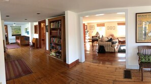 View through the interior of the ground floor, queen sleeper sofa and daybed