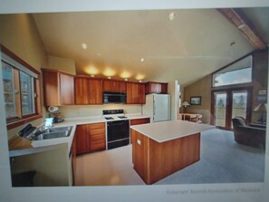 Kitchen now has granite island 