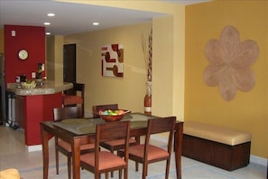 A Spacious Dining Area and Eating/Serving bar make entertaining a joy