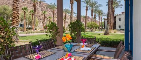 ENJOY ENCHANTING OUTDOOR DINING WITH VIEWS OF THE MOUNTAINS, LAWNS & FOUNTAIN!