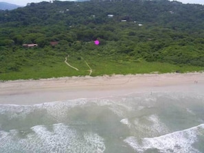 The purple dot is the location of the Beach House. Playa Guiones in foreground.