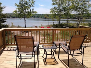 Relax on the reclining deck chairs with ottomans