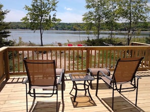 Relax on the reclining deck chairs with ottomans