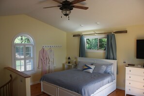 Relax in your king size bed w/central AC & ceiling fan. Bathroom is on 1st floor