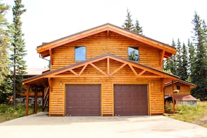 Our home.  The two windows above the garage are the rental bedrooms.