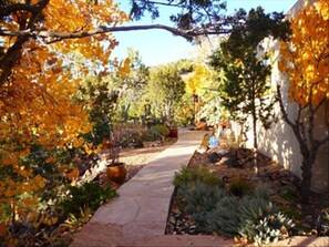 Front path leads to patio, perfect for sunset viewing