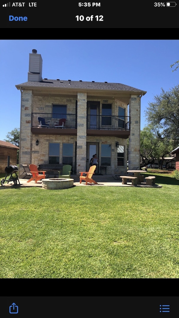 Beautiful patio with fire pit and comfy seating