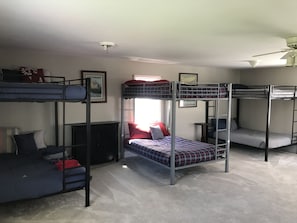 Bunk room with three full bunks + shower + kitchenette.