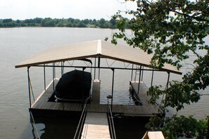 Covered Boat Dock With One Slip Available Others Can Be Tied Up On The Sides