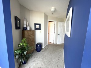 Hallway in master suite leading to bathroom