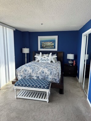 Primary bedroom with walk-in closet