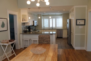Spacious dining area and fully stocked kitchen with all the amenities