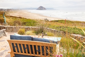 Seating on the veranda for views of Morro Rock and the sea.